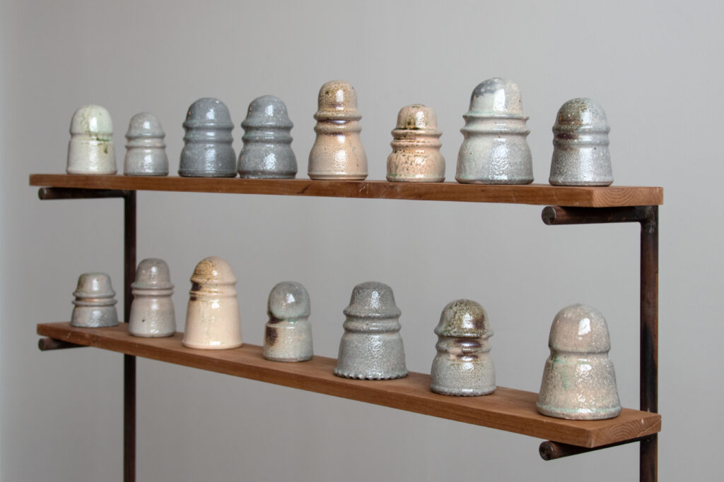 Insulators, Comstock