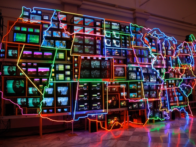 Electronic Superhighway; Nam June Paik, 1995 CE, TV monitors, laser disc images, neon, 15 x 32&#039;