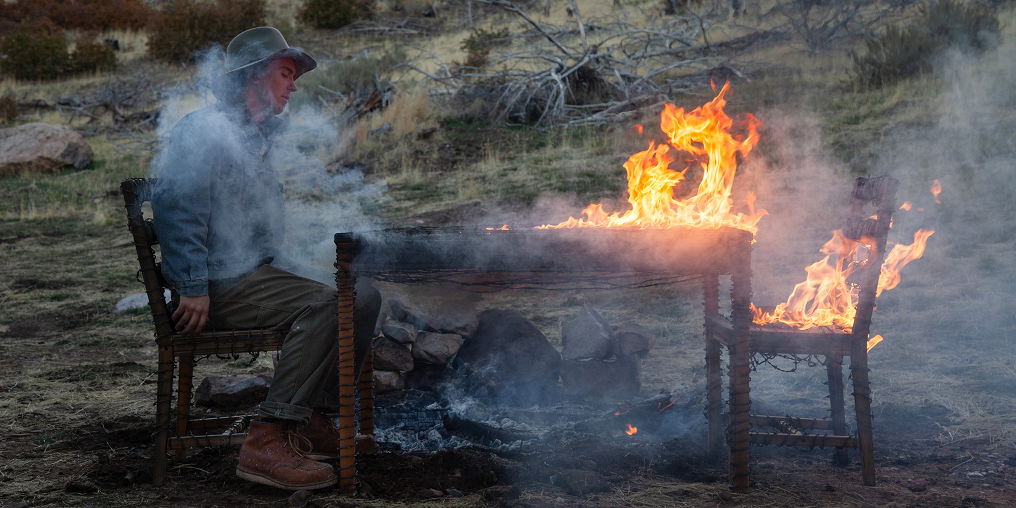 Response & Responsibilty, by Douglas Tolman and Alec Bang, performance, barbed wire, dining set, fire