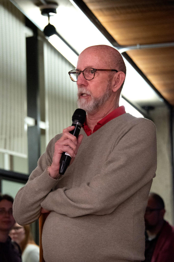 Annual Student Exhibition Opening Reception: Whit Hollis, Director of the Olpin Student Union, announces the Union purchase award