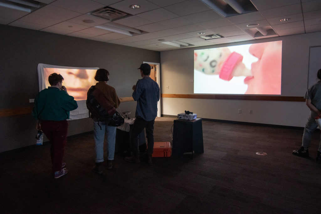 Video Evidence Exhibition, artwork by Comstock (left) and Bea Hurd (right)