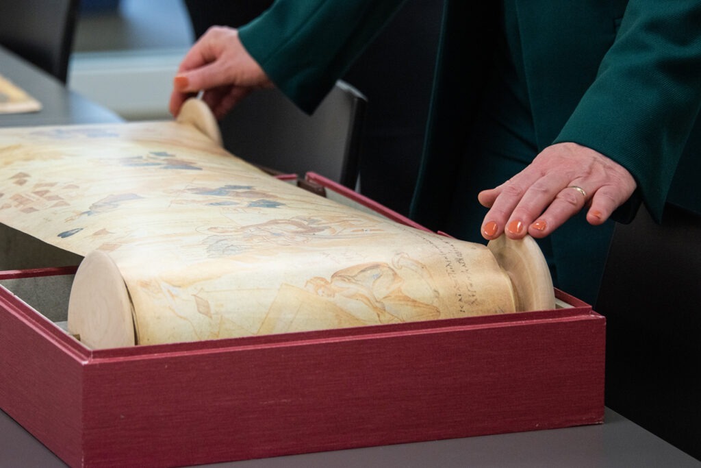 Art Historian Alexa Sand in Marriott Library Special Collections with students from Professor Meekyung MacMurdie's Medieval Art class, March 2023