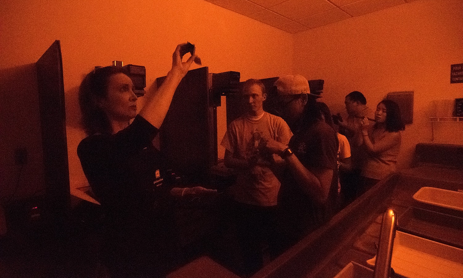 Professor Laurel Caryn in class in the darkroom